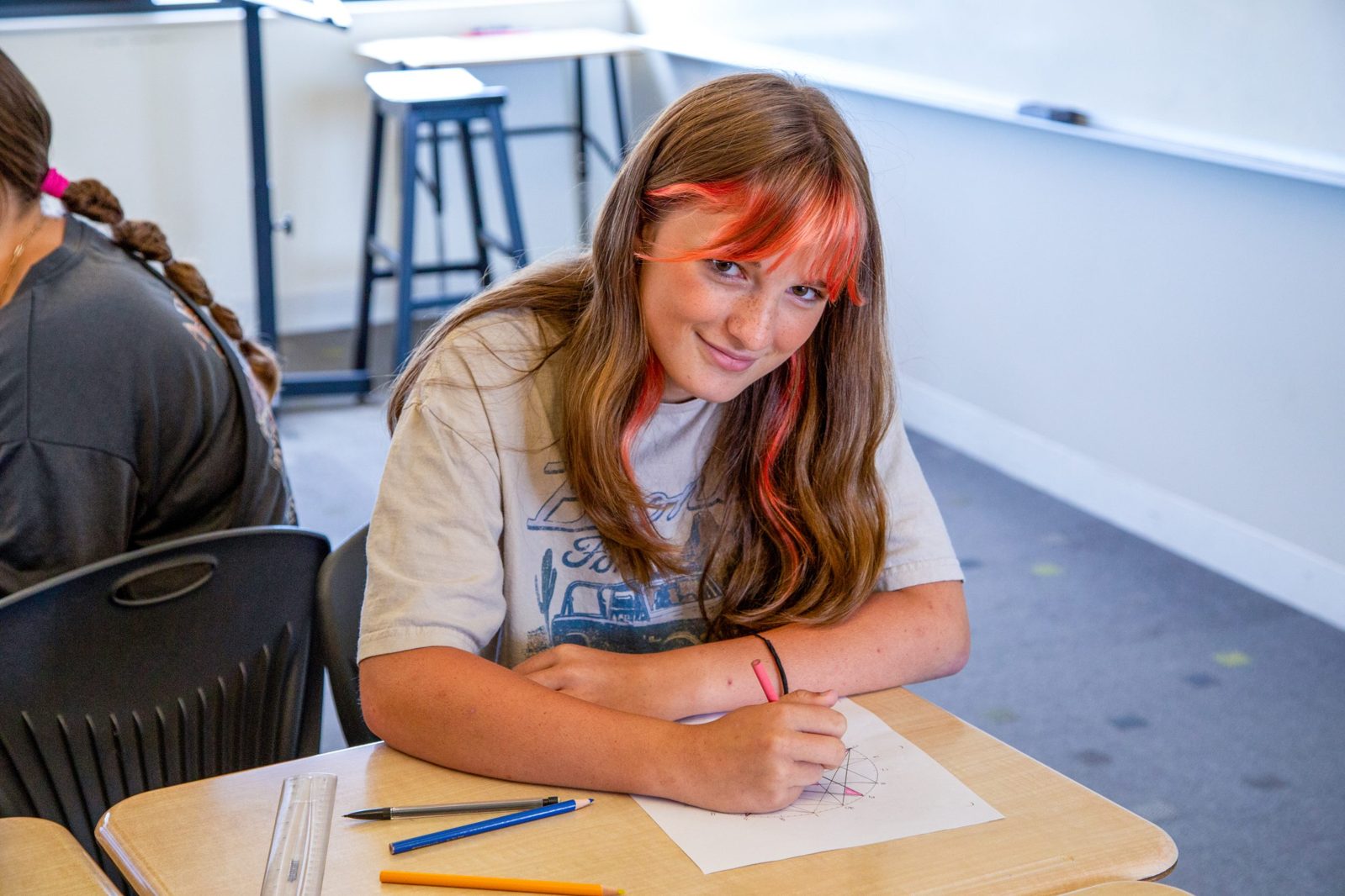 Student working on a project at their desk